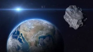 Illustration of the 1997 NC1 asteroid during its close Earth flyby with the planet visible in space