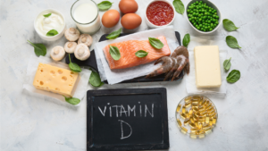 Healthy foods rich in calcium and vitamin D with salmon, yogurt, kale, broccoli, and tofu