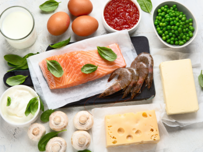 Foods rich in calcium and vitamin D including salmon, milk, Greek yogurt, cheese, broccoli, kale, tofu, and eggs for strong bones