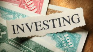 Saving vs investing infographic explaining the differences between saving money and investing for long-term wealth.