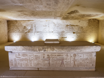 Ancient Egyptian Sorcerer Tomb Discovery with archaeologists exploring a newly uncovered burial chamber