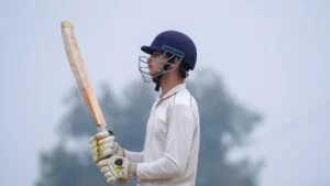 Batsman running between wickets explaining how is cricket played