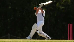 Fast bowler throwing the ball on the pitch in how is cricket played