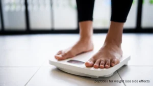 A healthcare professional explaining peptides for weight loss side effects to a patient.