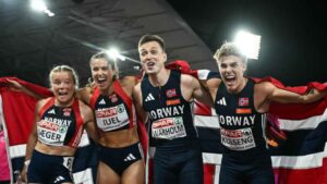 Karsten Warholm crossing the finish line in Tokyo Olympics 400m hurdles