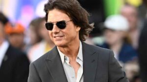 Tom Cruise age in Mission Impossible showing how old is Tom Cruise doing motorcycle jump stunts