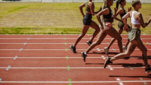 A group of sprinters at the starting blocks highlighting what are the events in track and field